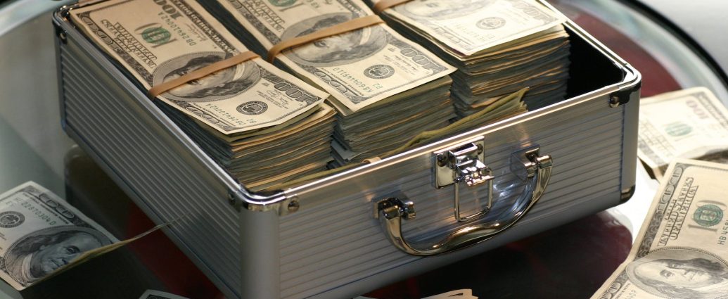 hard cash on a briefcase