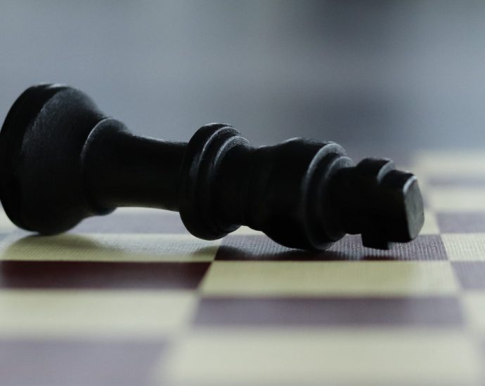 chess piece lying on the chessboard